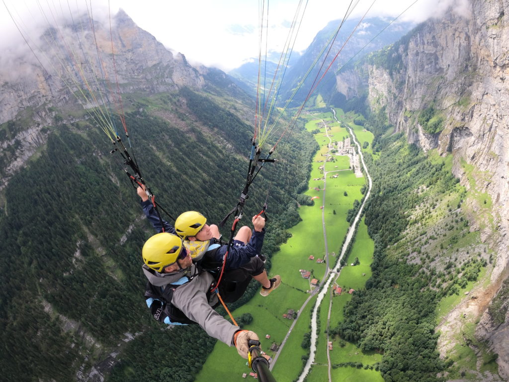 people paragliding in the air