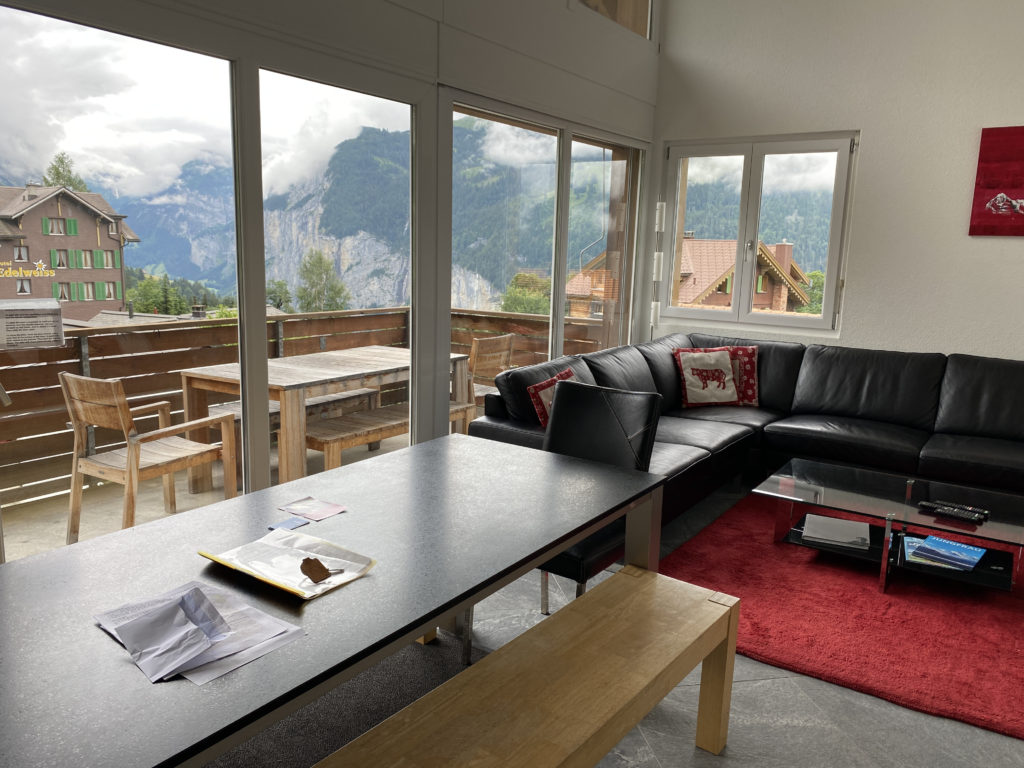 a living room with a couch and a table