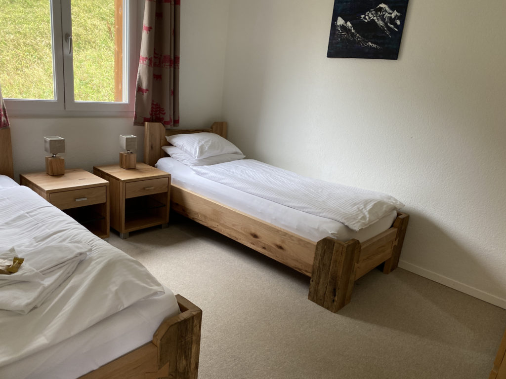 a bedroom with two beds