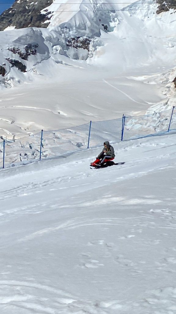 a person on a snow ski