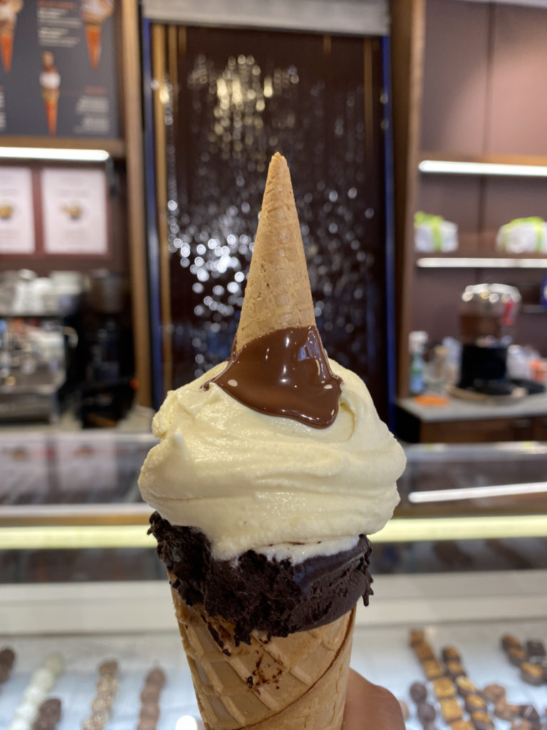 a chocolate and vanilla ice cream cone