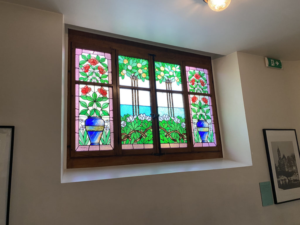 a stained glass window in a room