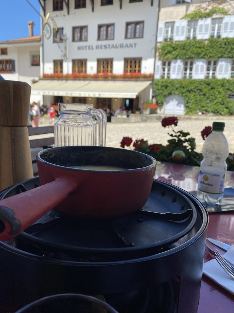 a pot with a handle on a table