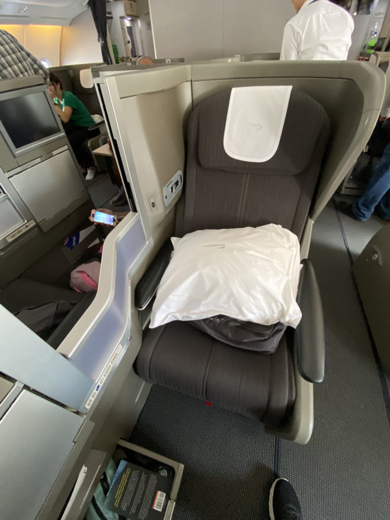 a seat with a pillow on it