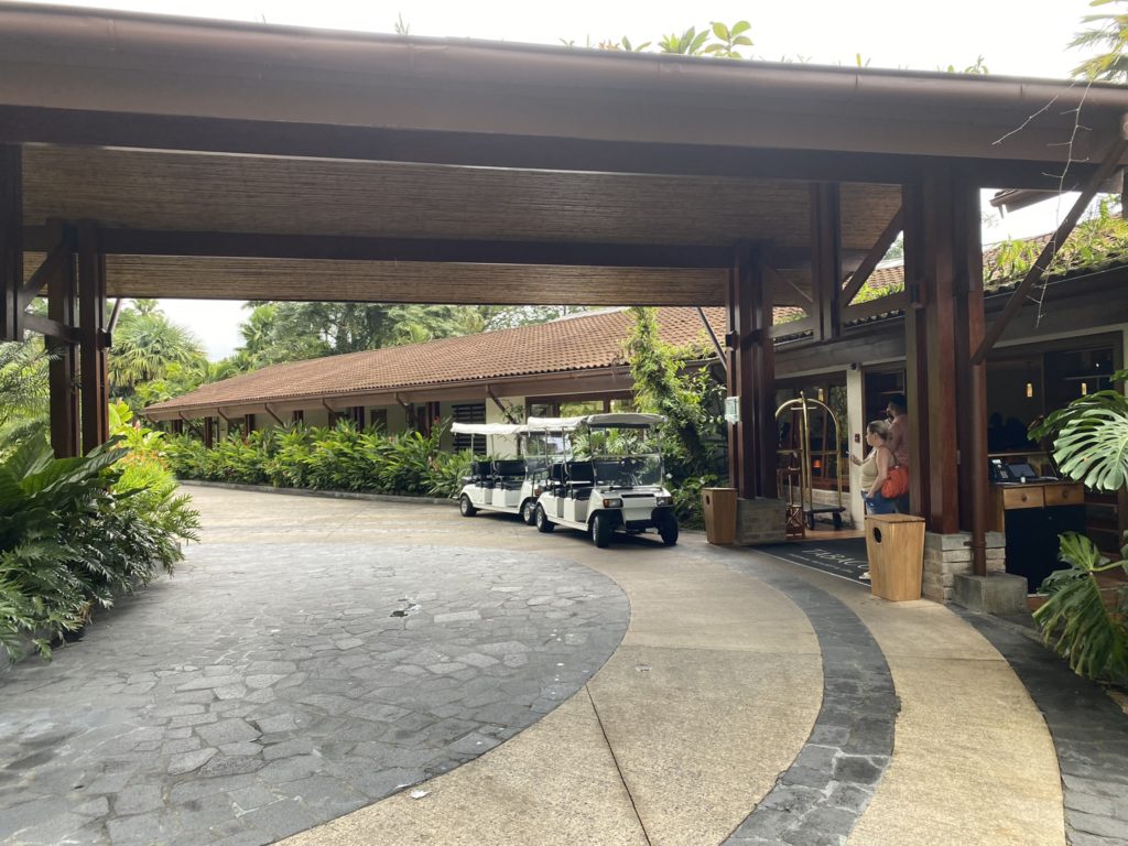 a golf cart parked in front of a building
