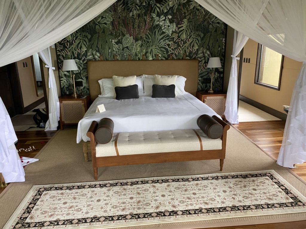 a bed with a canopy over it