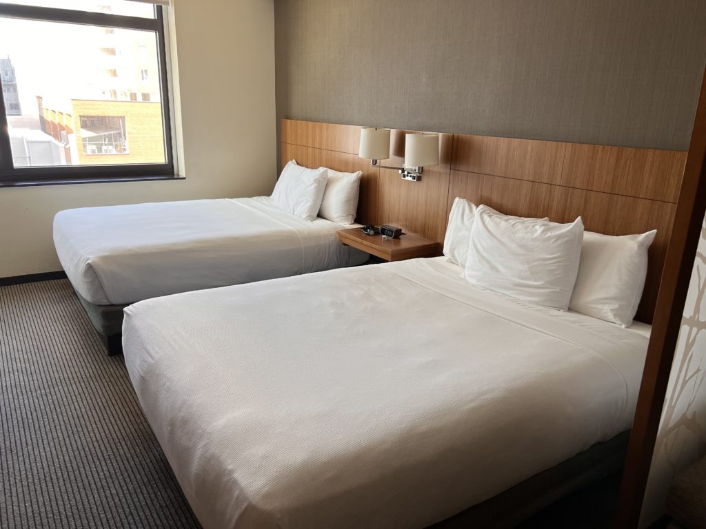 two beds in a hotel room