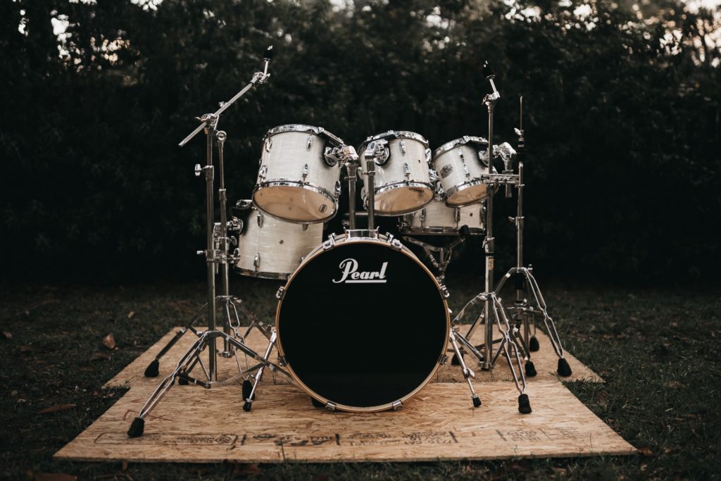 a drum set on a mat