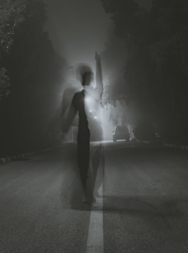 a person walking on a road
