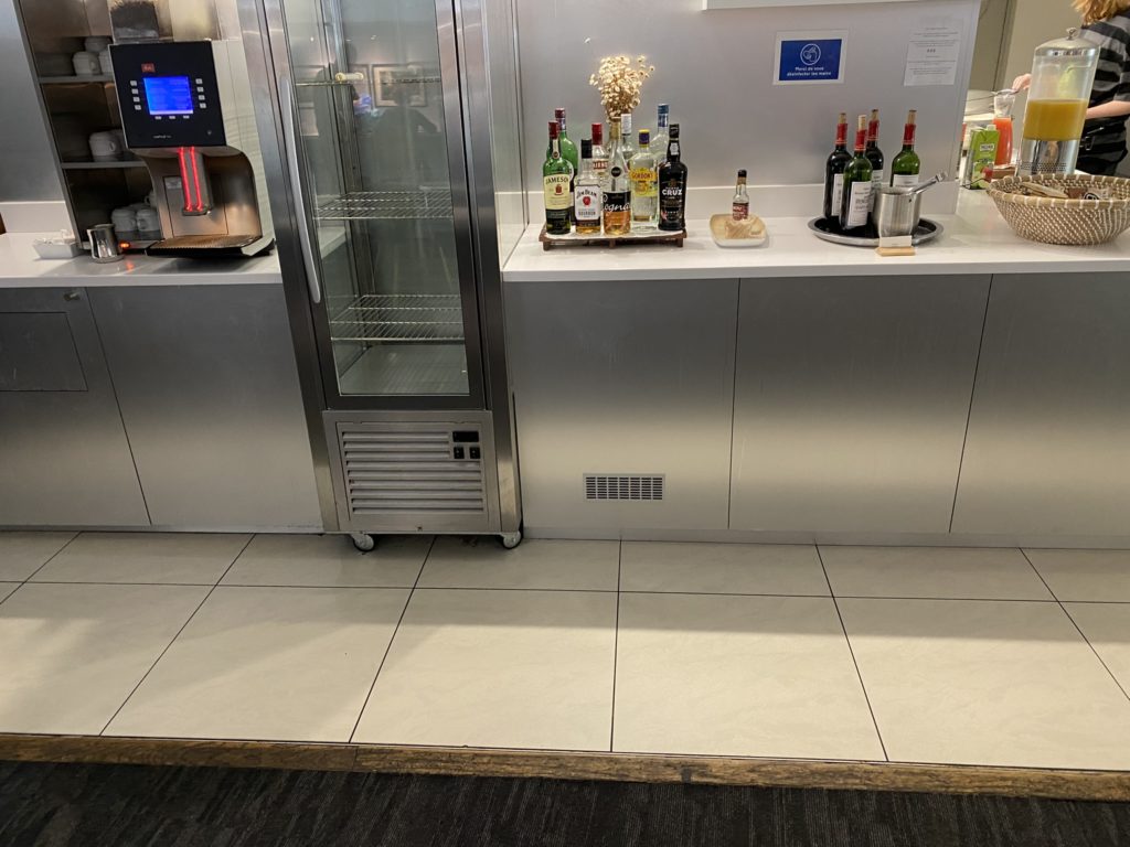 a bar with bottles of alcohol on it