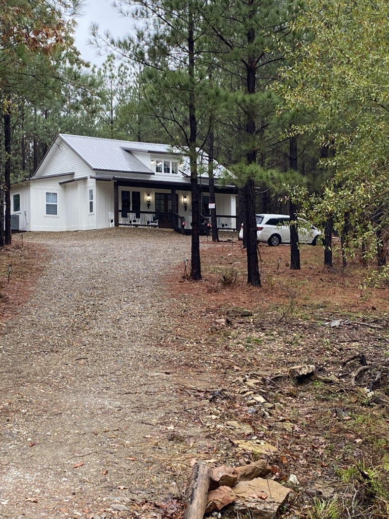 a house with trees around it
