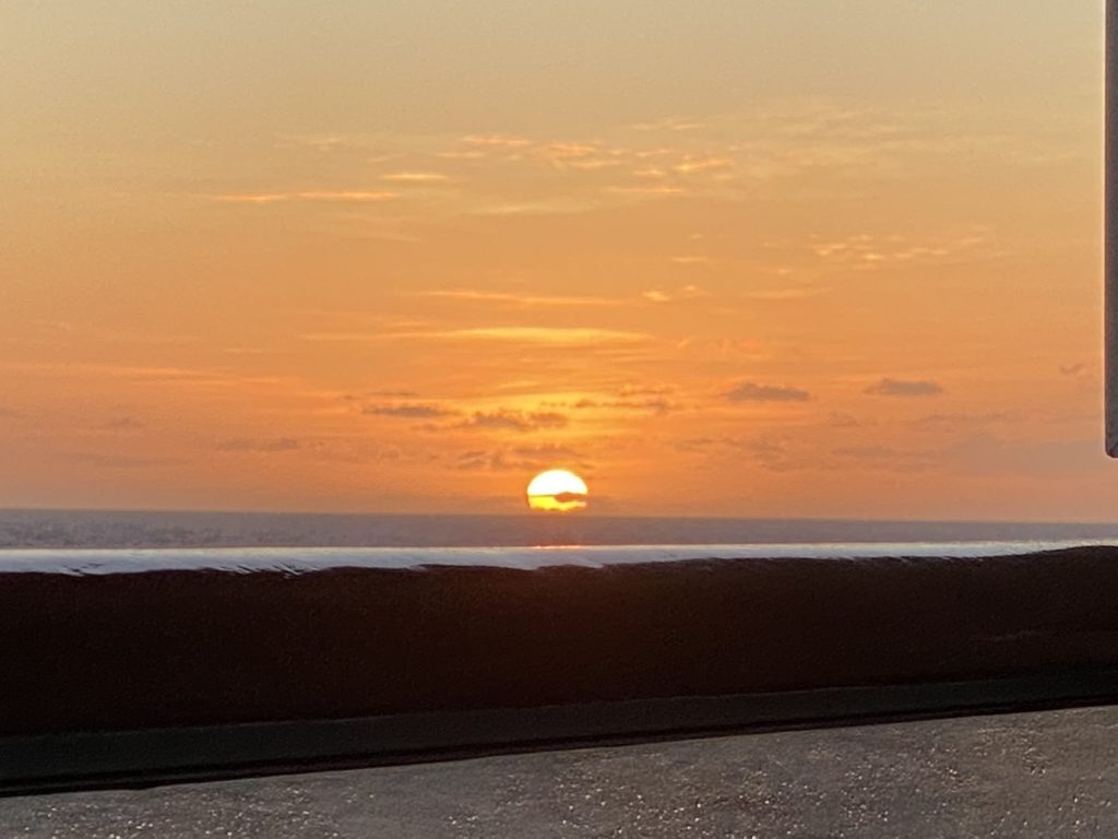 a sunset over the ocean
