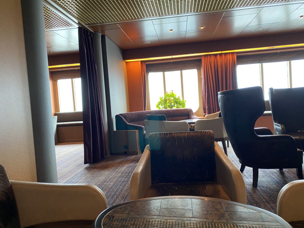 a room with chairs and a table