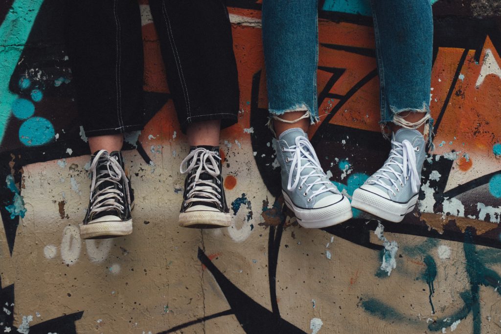 a group of people wearing shoes