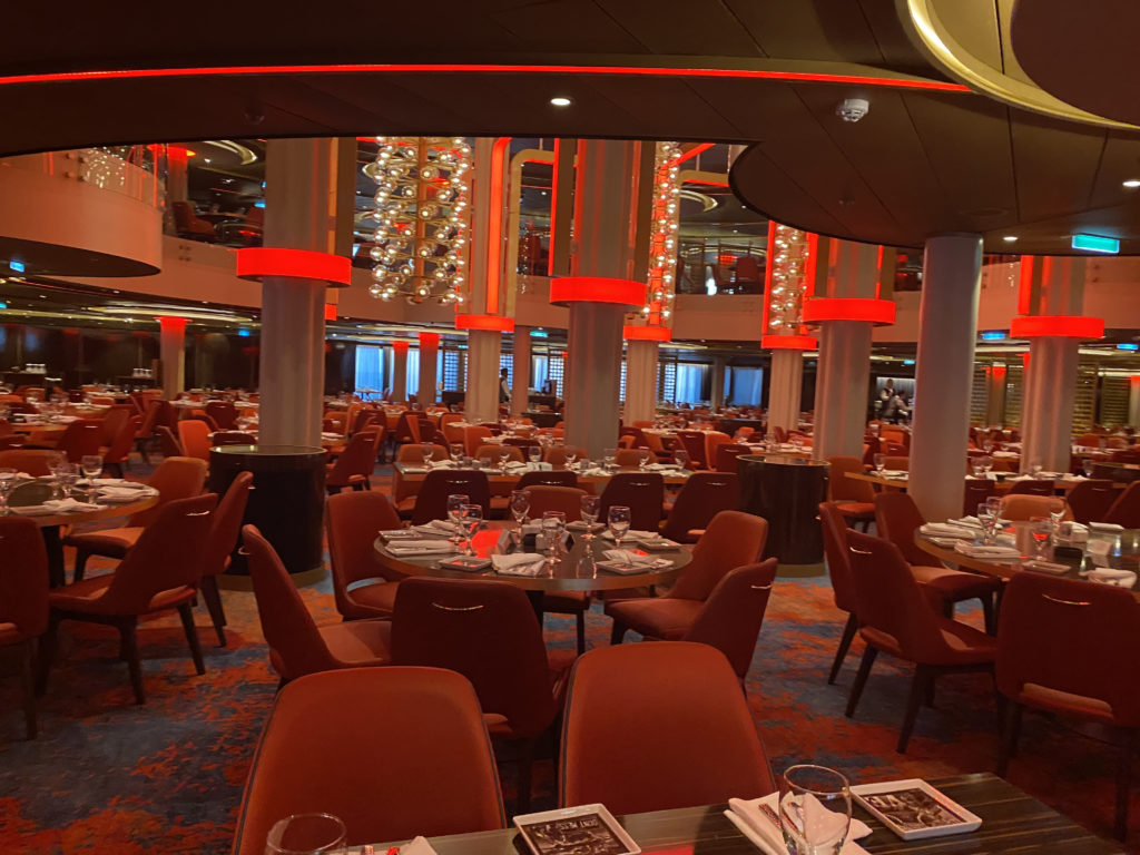 a large room with tables and chairs