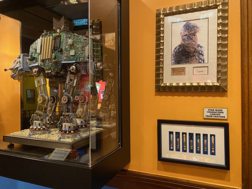 a display case with a robot in it