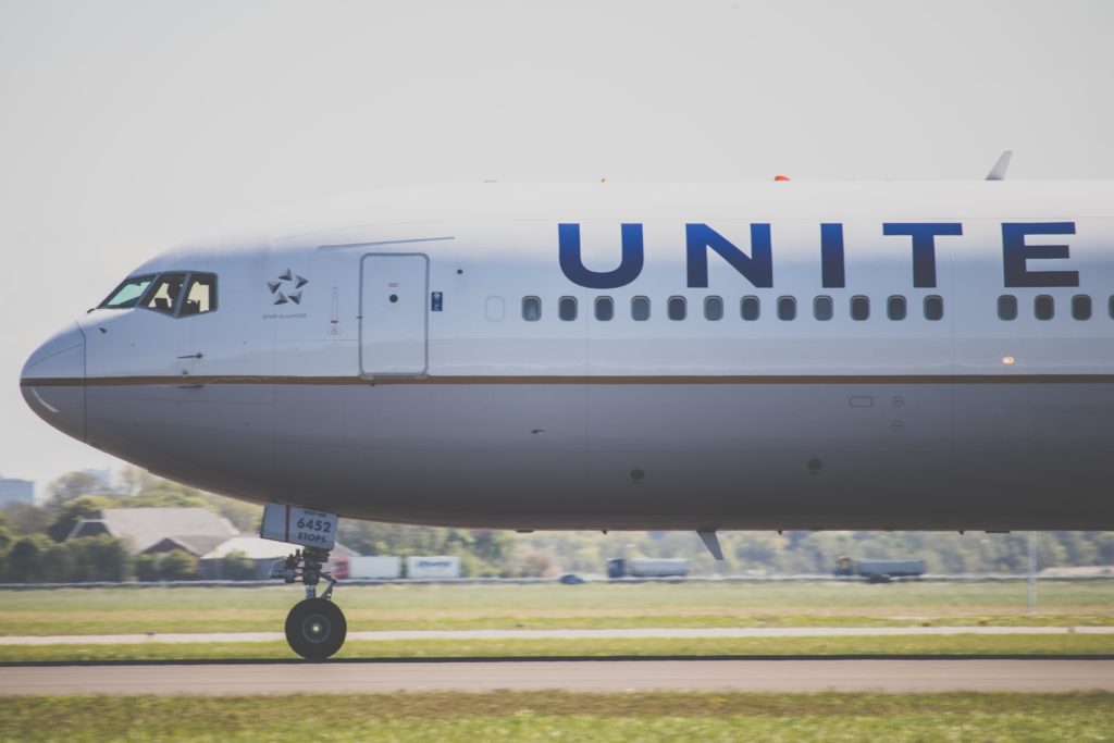 the front of a plane on the runway