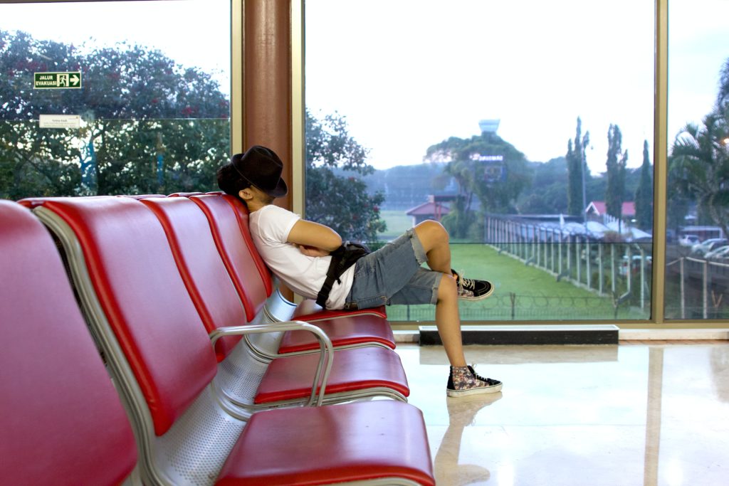 a person sleeping on a bench