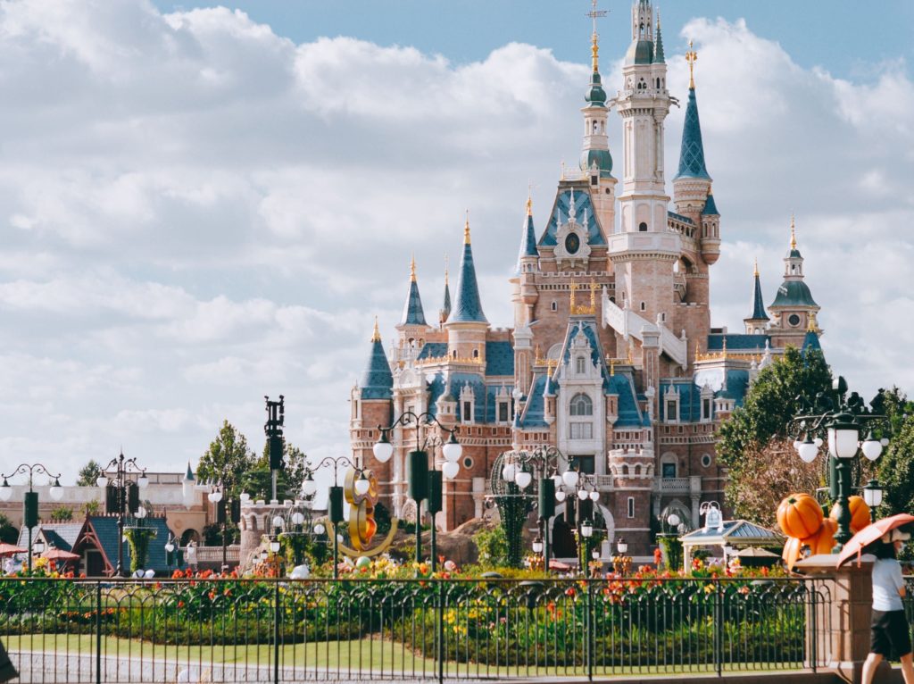 a castle with blue and white towers
