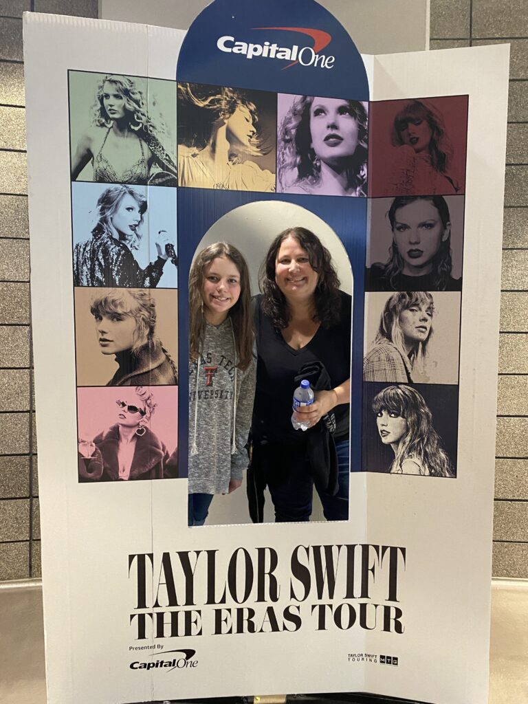 a woman and a girl standing in a poster