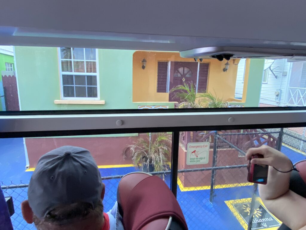 a group of people looking out a window