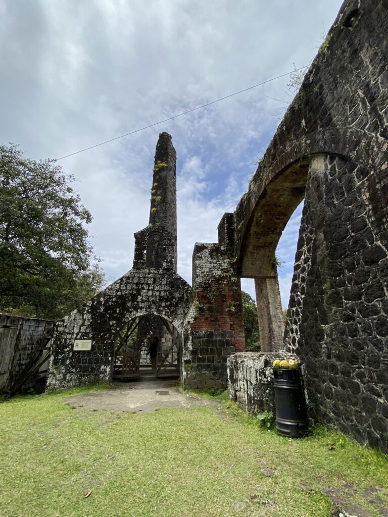 an old stone building with a stone arch