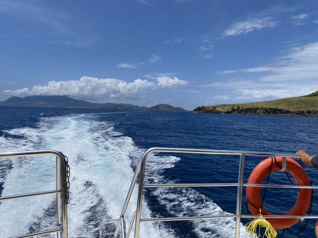 a boat with a body of water behind it