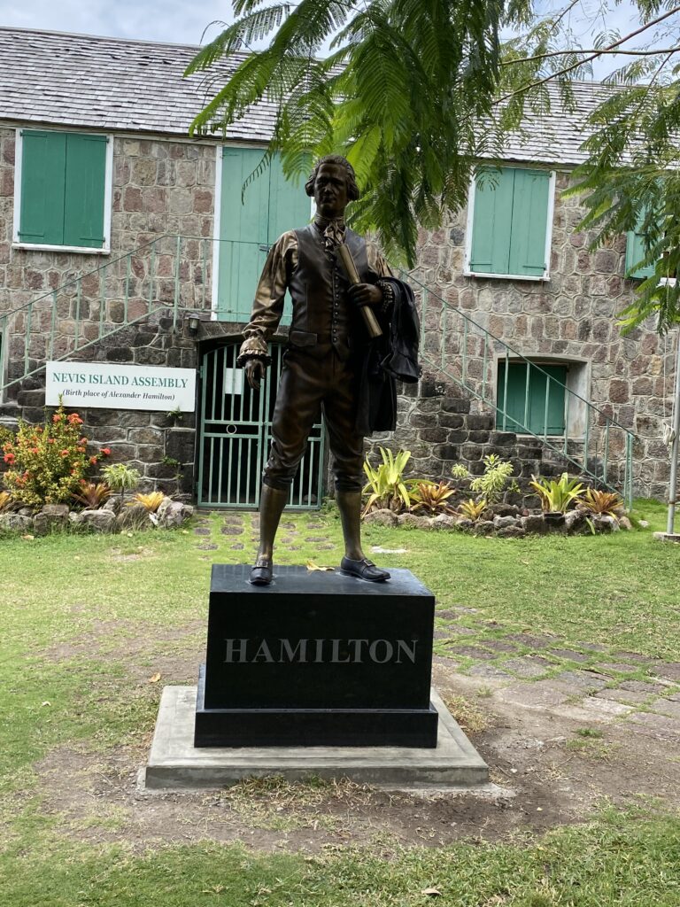 a statue of a man in a park