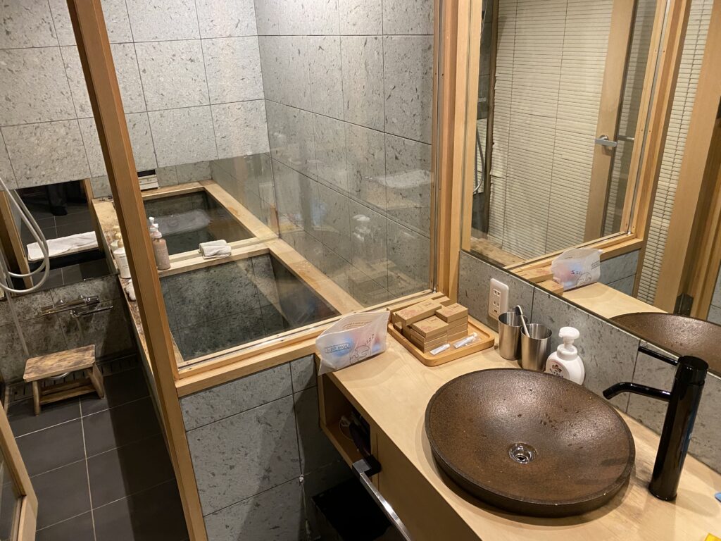 a bathroom with a sink and a shower
