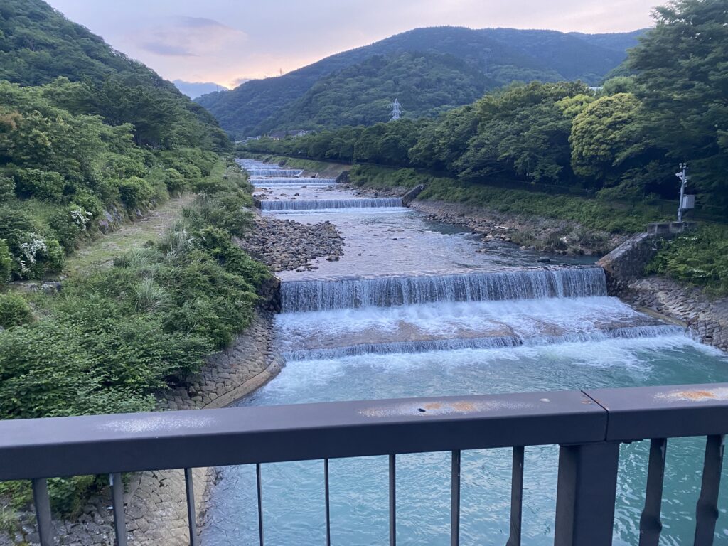 a river with a bridge over it