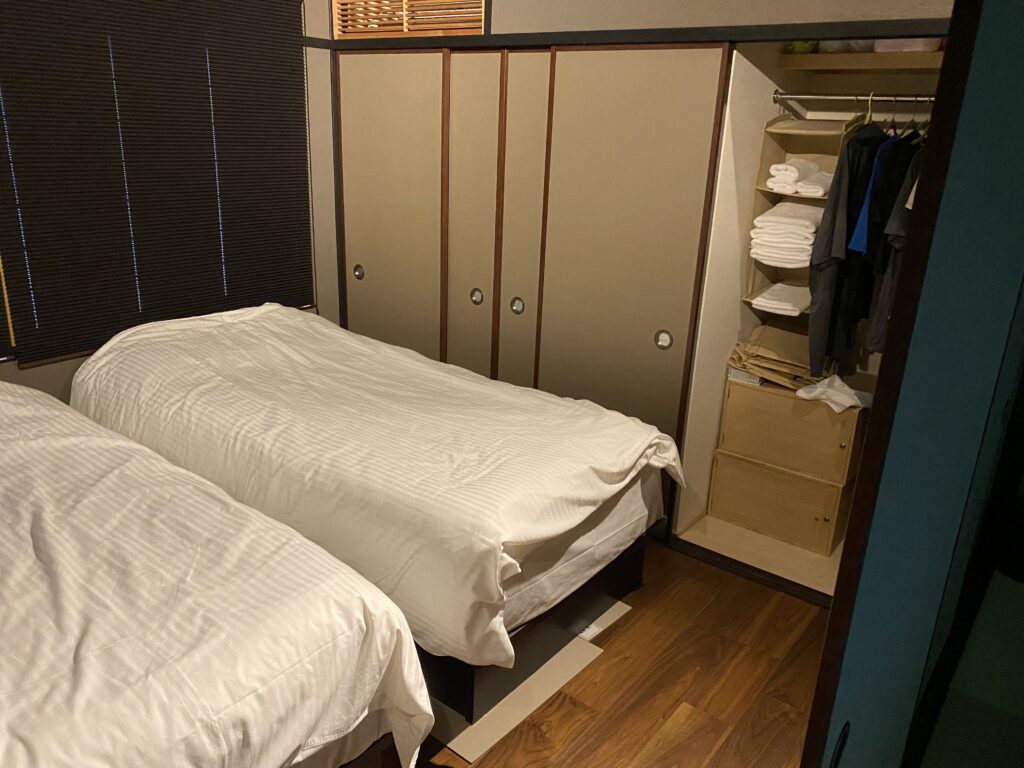 a room with a closet and bed
