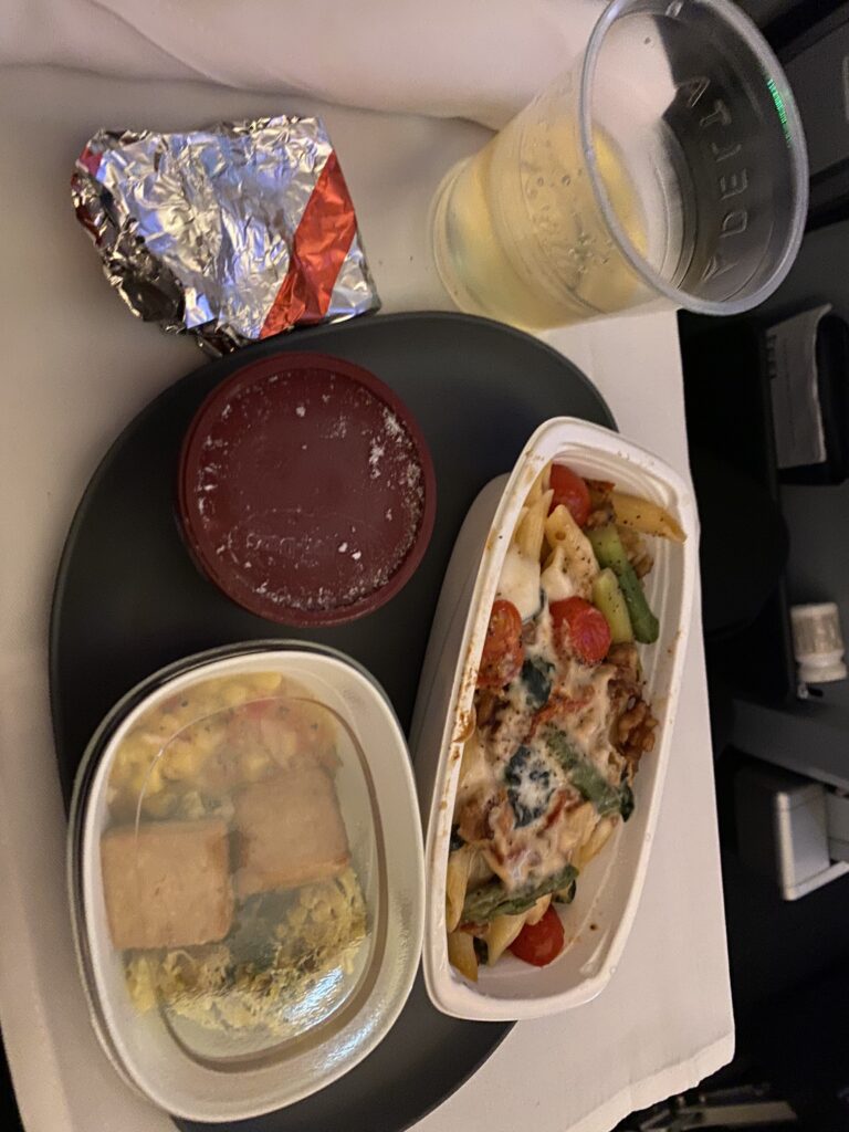 food in a container on a tray