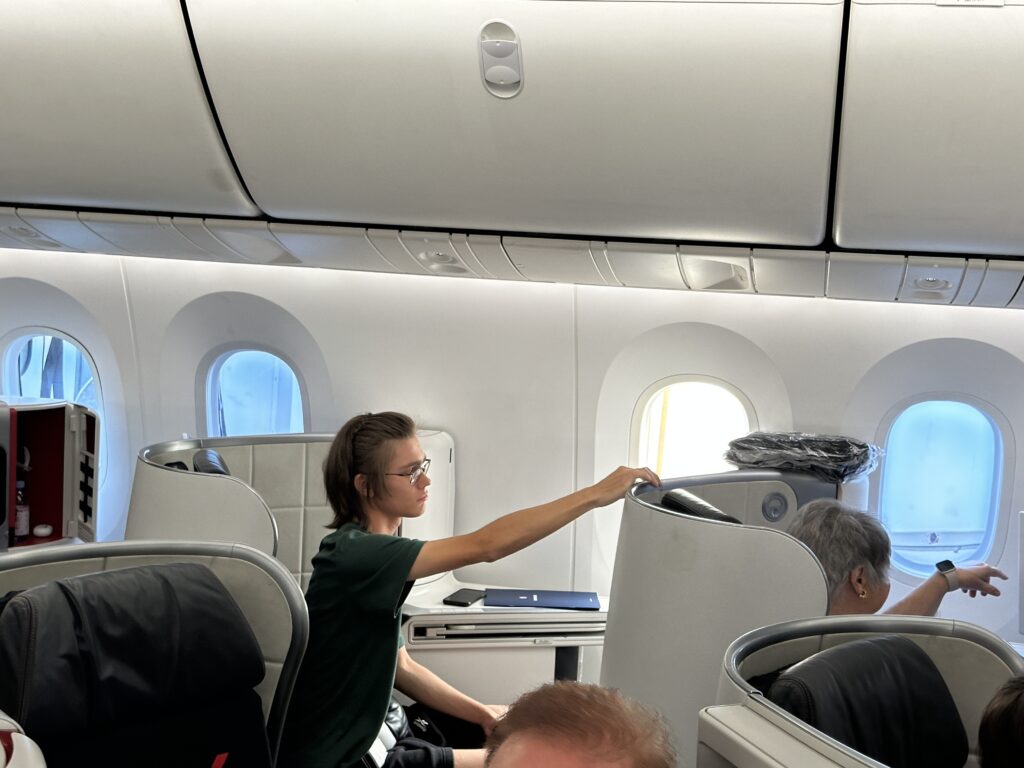 a woman sitting on an airplane