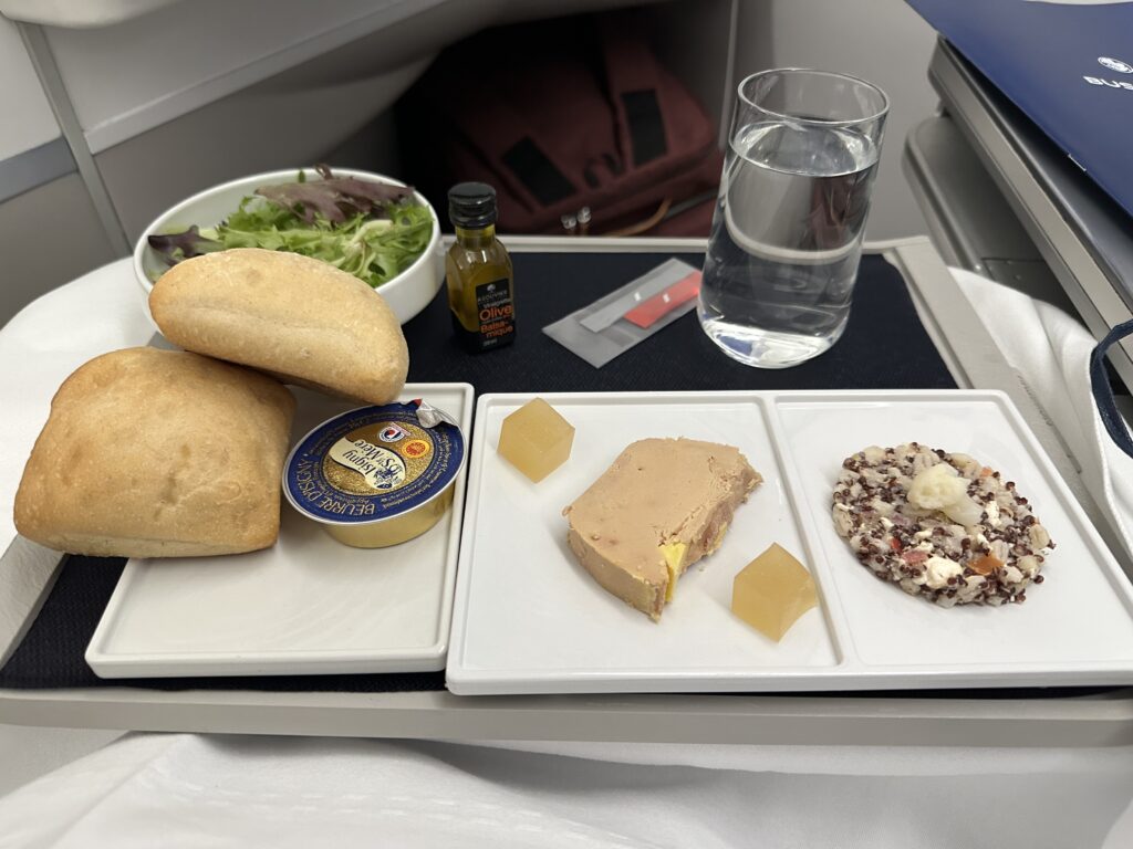 food on a tray on a plane