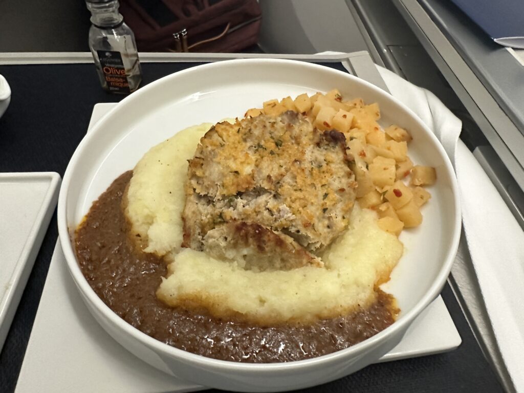 a plate of food on a tray