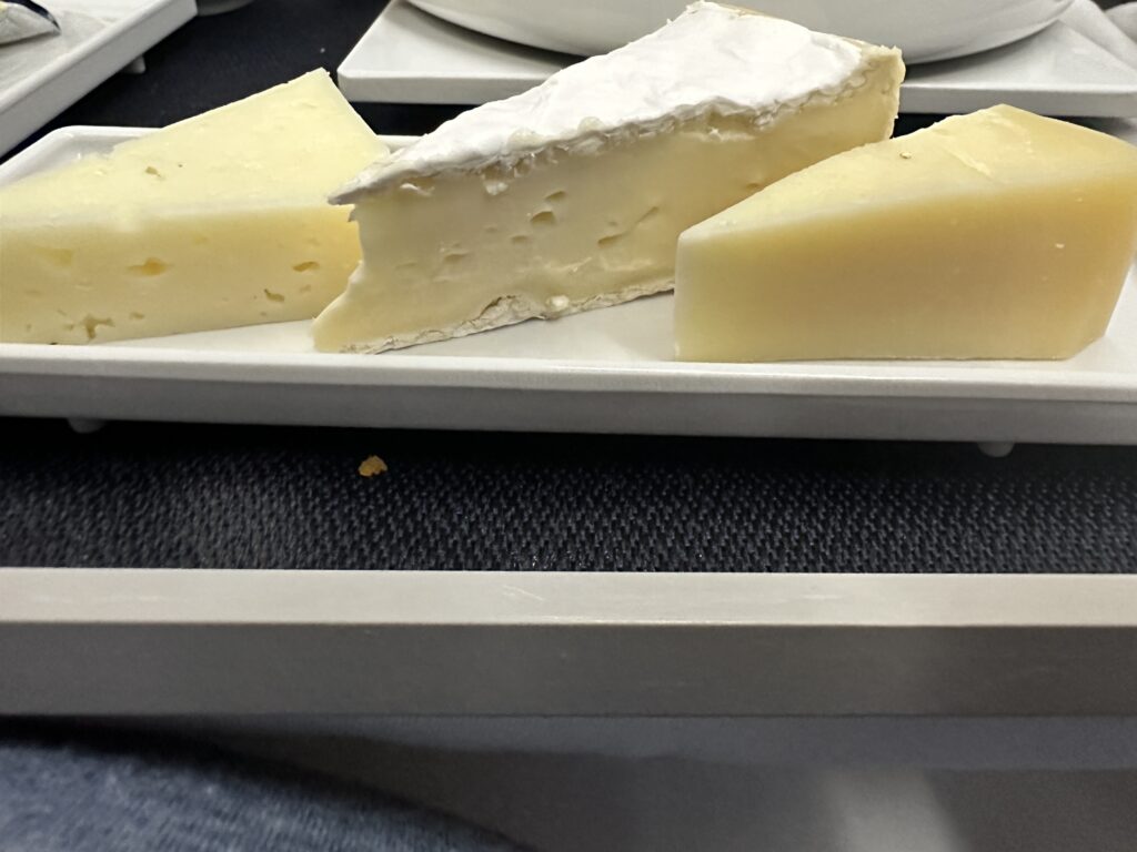 a plate of cheese on a tray
