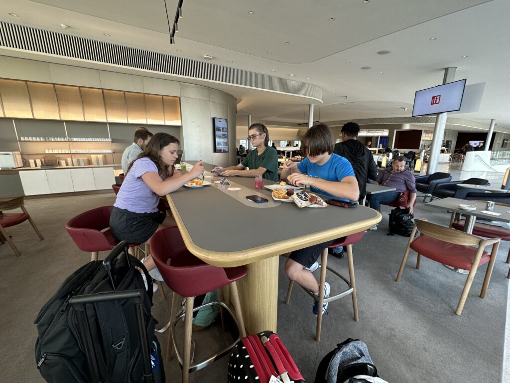 a group of people eating at a table