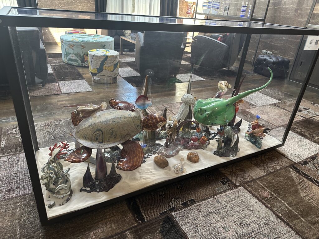 a glass table with a group of sea creatures