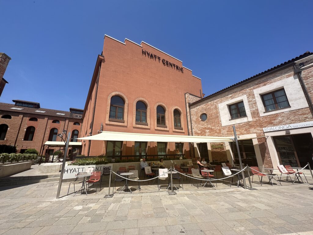a building with a group of tables outside