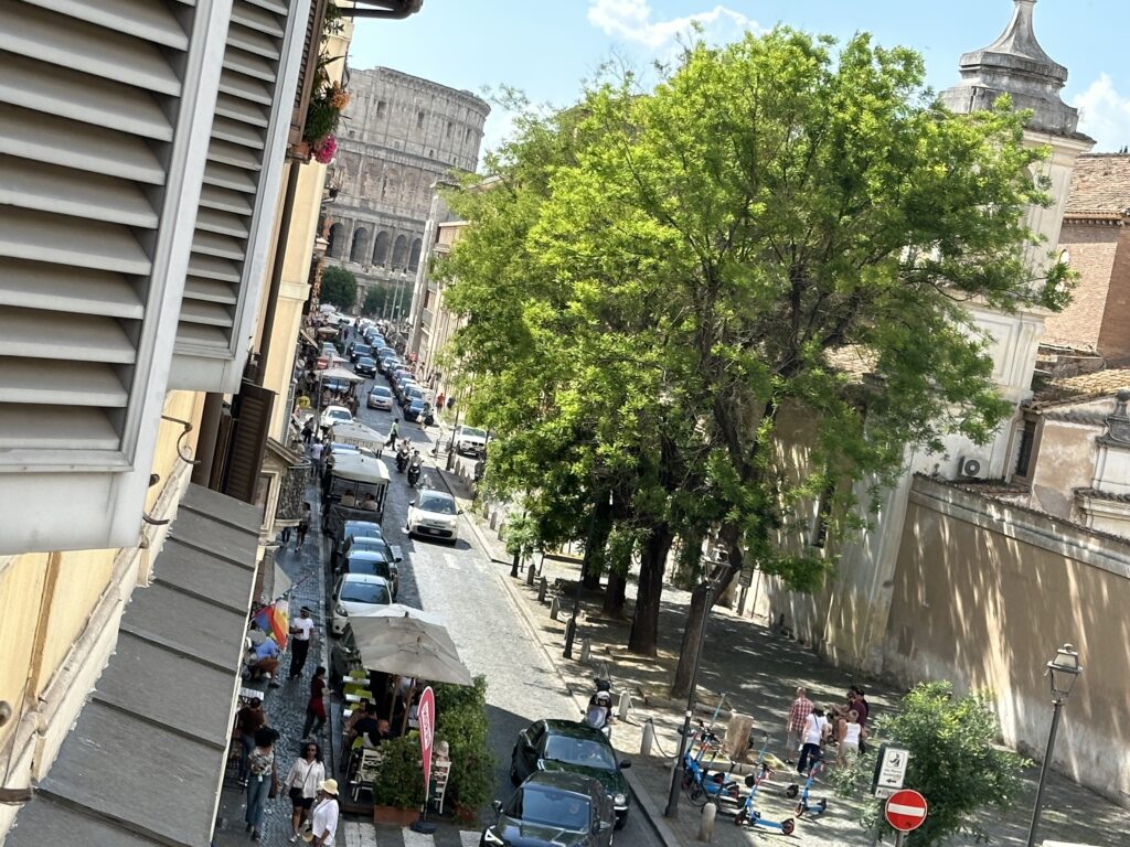 a street with cars and people on it
