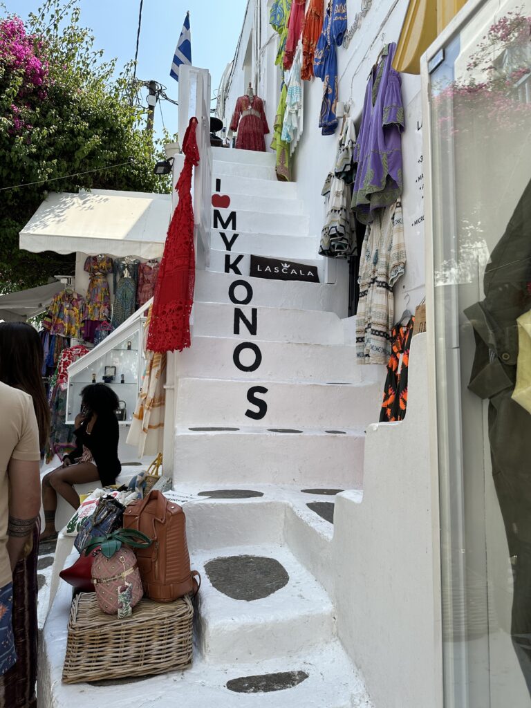 a white stairs with a sign on it