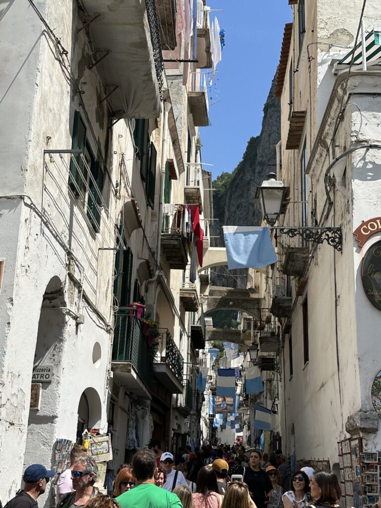 a street with people and buildings
