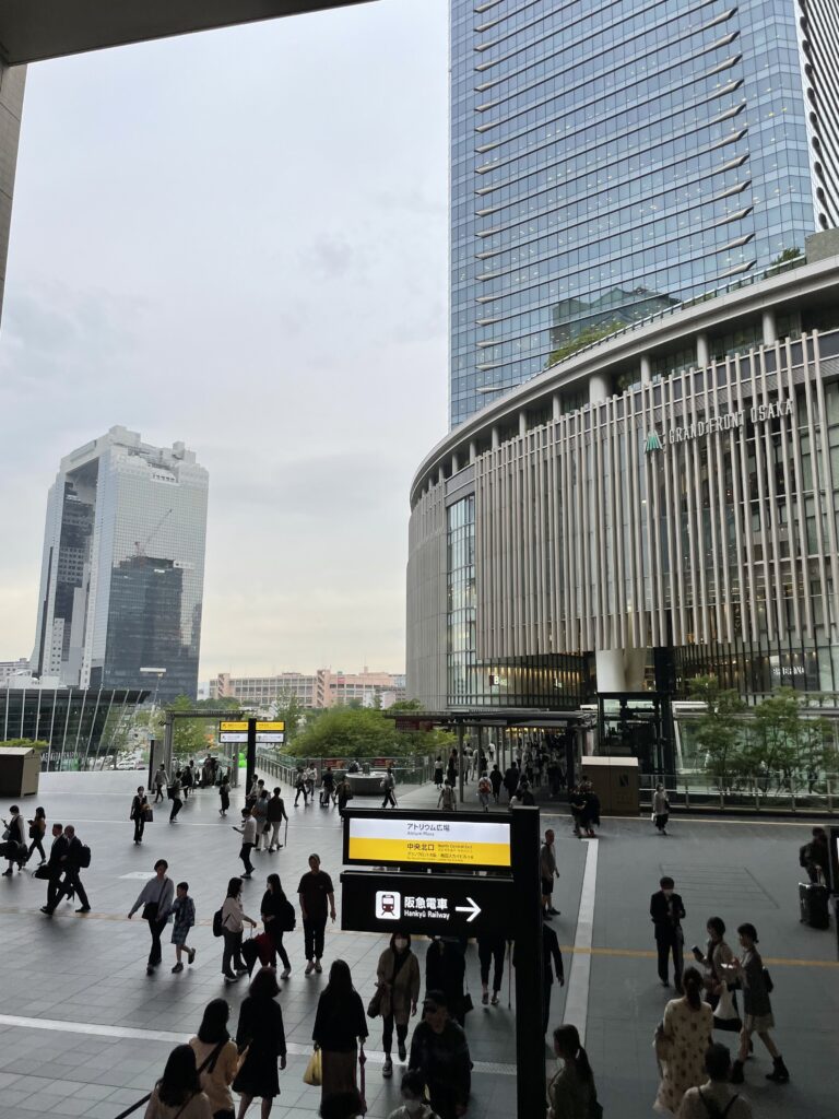 a group of people walking in a city