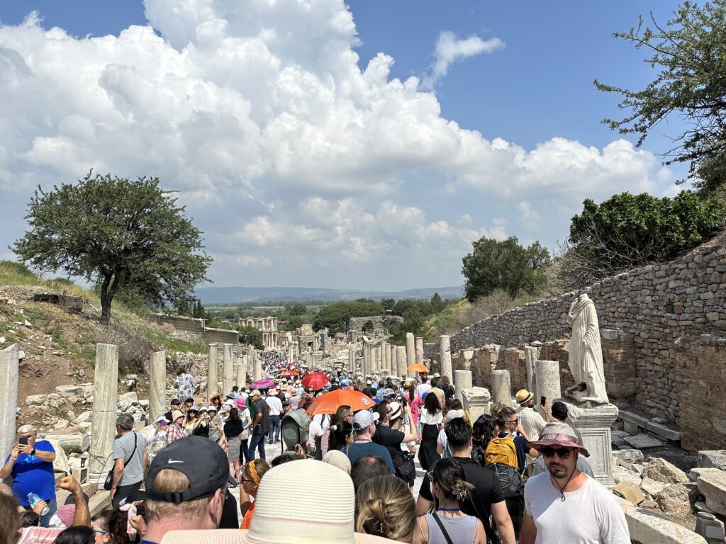 a group of people walking in a crowd
