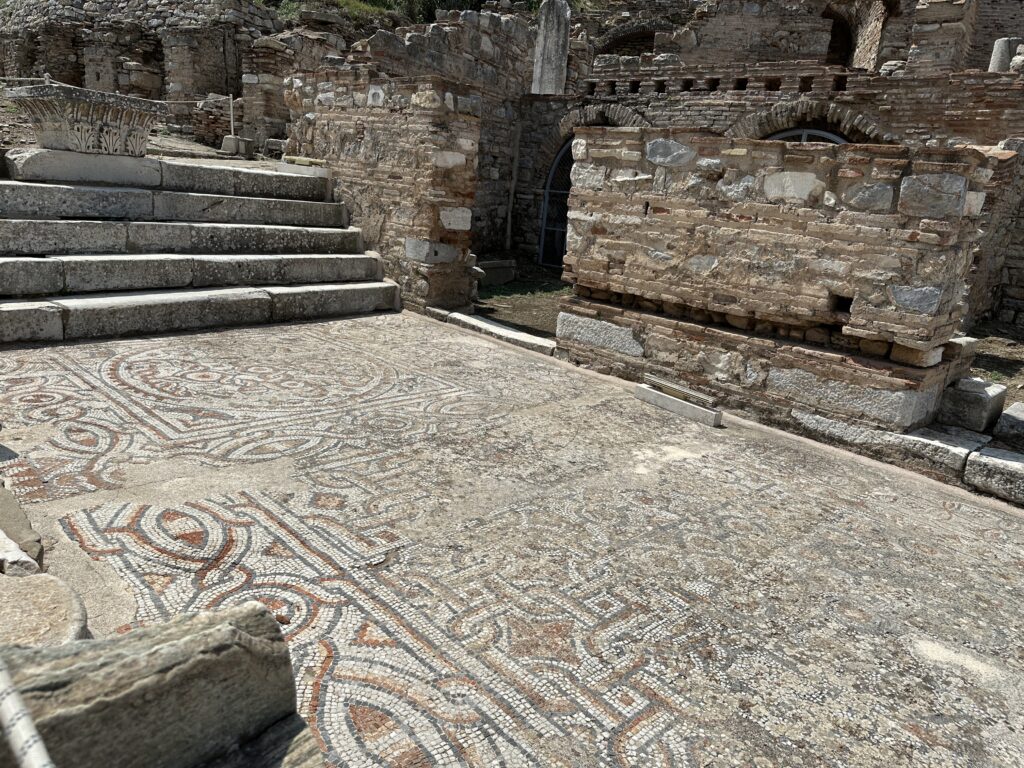 a stone walkway with steps and stone walls