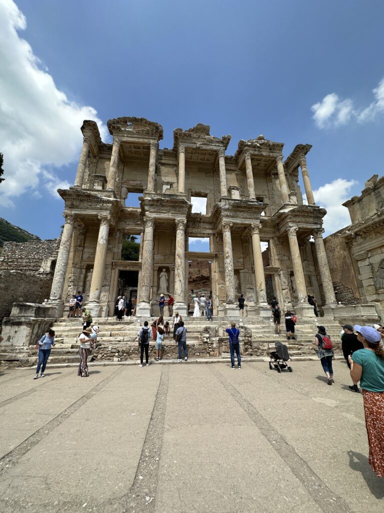 a group of people standing outside of a building