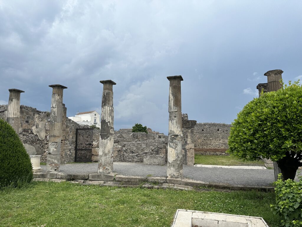 a stone pillars in a courtyard