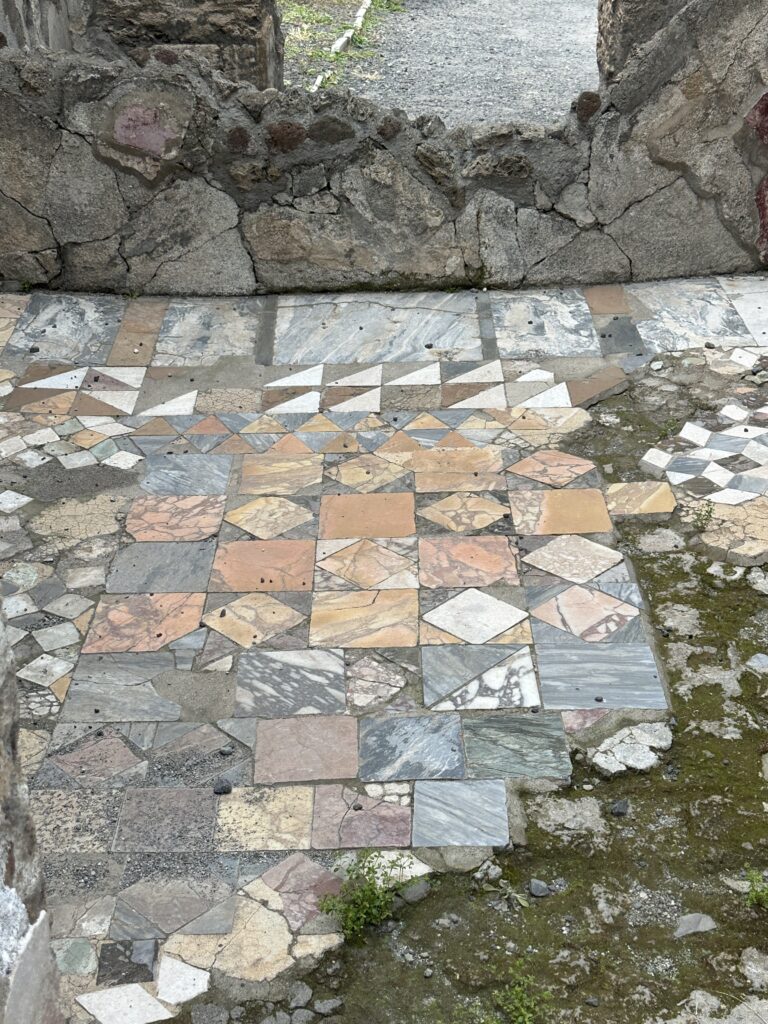 a stone floor with a pattern