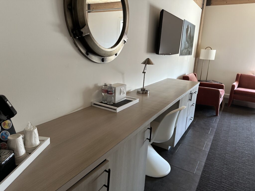 a room with a mirror and a table