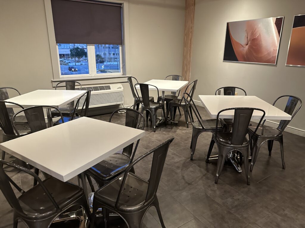 a room with tables and chairs